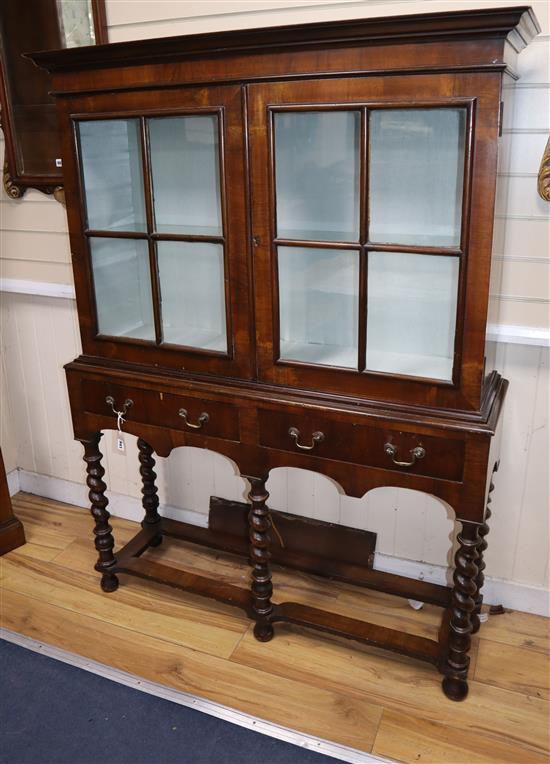 A 1920s Queen Anne revival walnut display cabinet W.116cm
